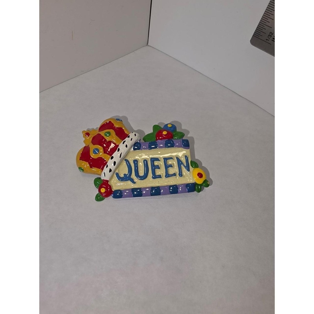 Mary Engelbreit "Queen of Everything" ceramic brooch features a colorful crown